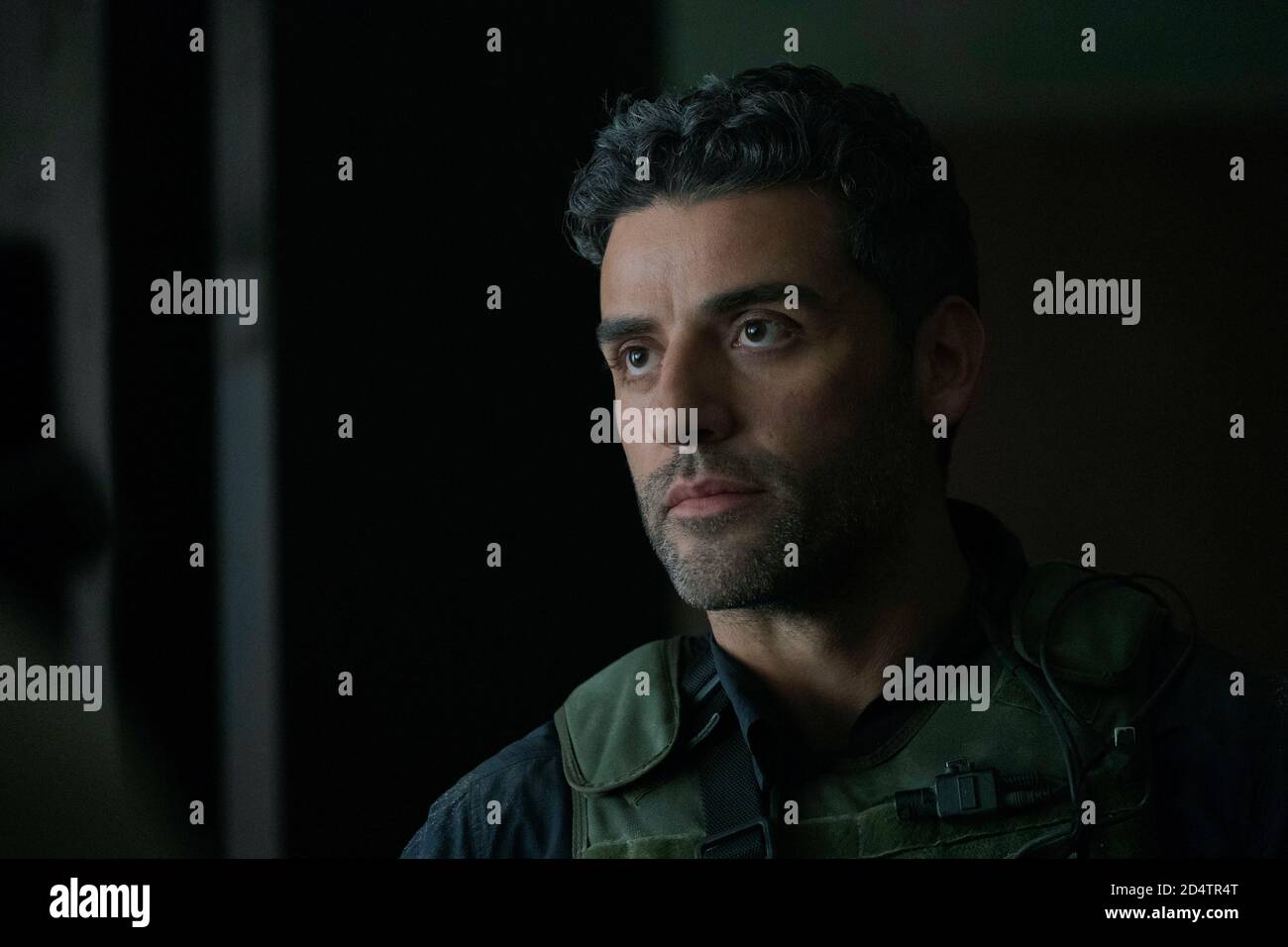 OSCAR ISAAC in TRIPLE FRONTIER (2019), directed by J. C. CHANDOR. Credit: ACQUIRE TALENT AGENCY/ATLAS ENTERTAINMENT / Album Stock Photo
