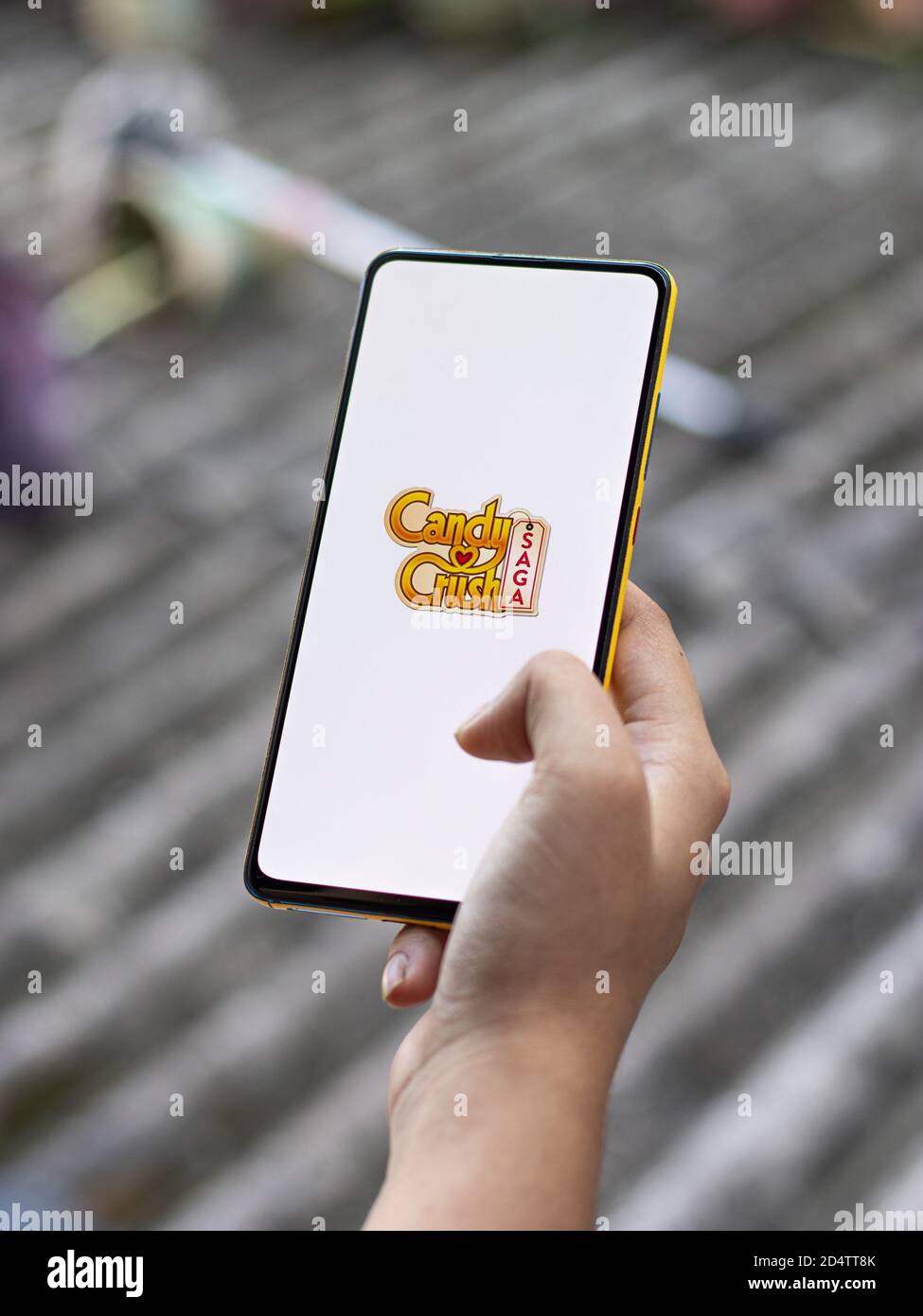Assam, india - October 11, 2020 : Candy crush saga logo on phone screen stock image. Stock Photo