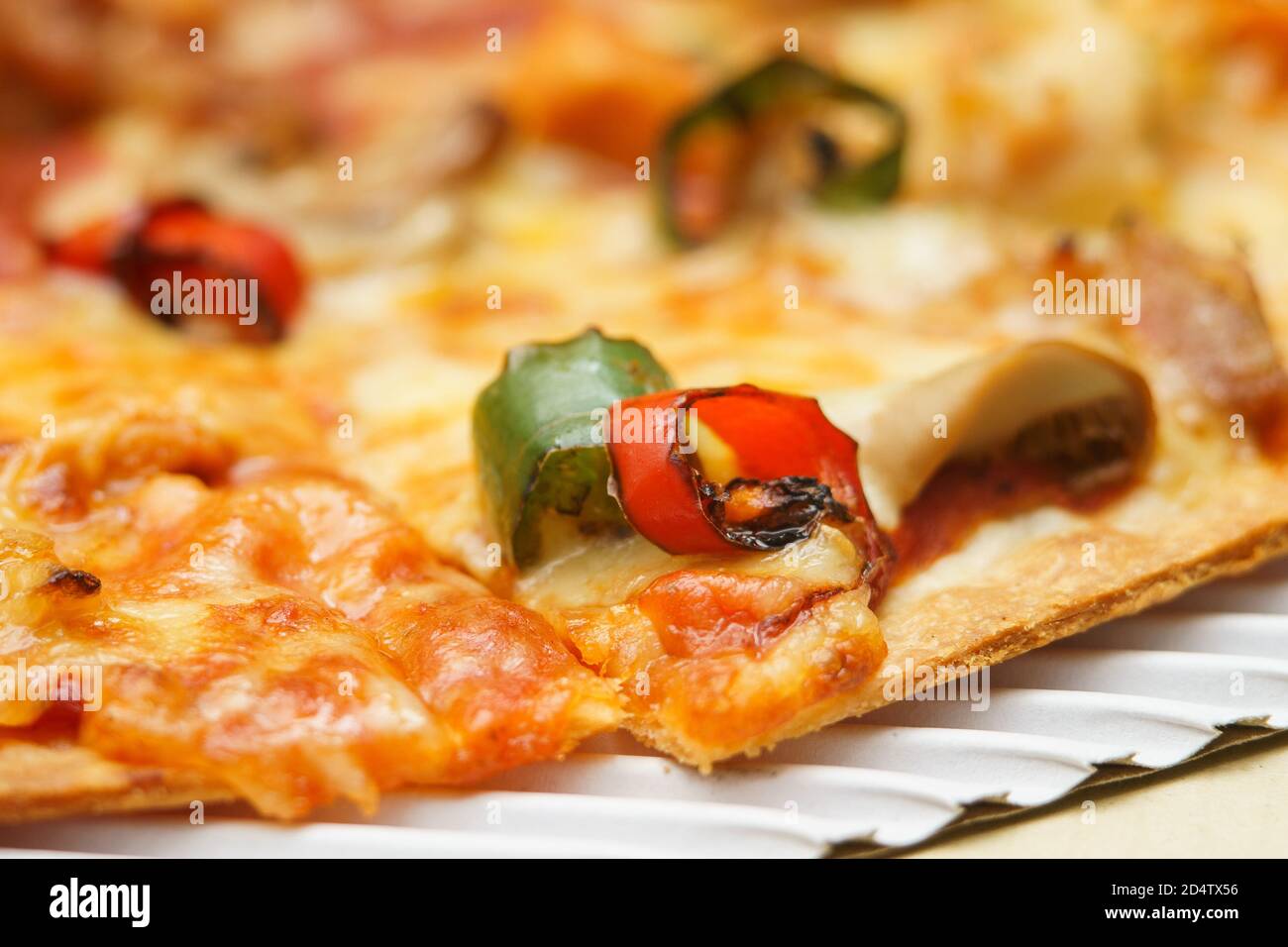 closed up of toping delicious pizza delivery box Stock Photo
