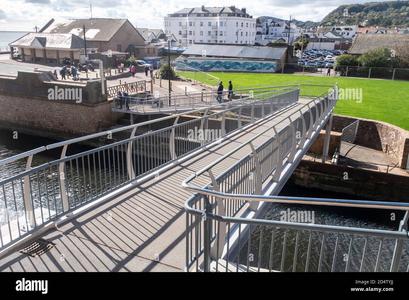 The new Alma Bridge Sidmouth, part of the South West Coastal Path, crossing the River Sid. Completed in October 2020, it's completion was delayed due Stock Photo