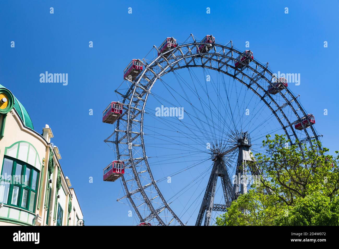 VIENNA - MAY 6: View of the famous ferris wheel Wiener Riesenrad in the Prater amusement park in Vienna, Austria on May 6, 2018 Stock Photo