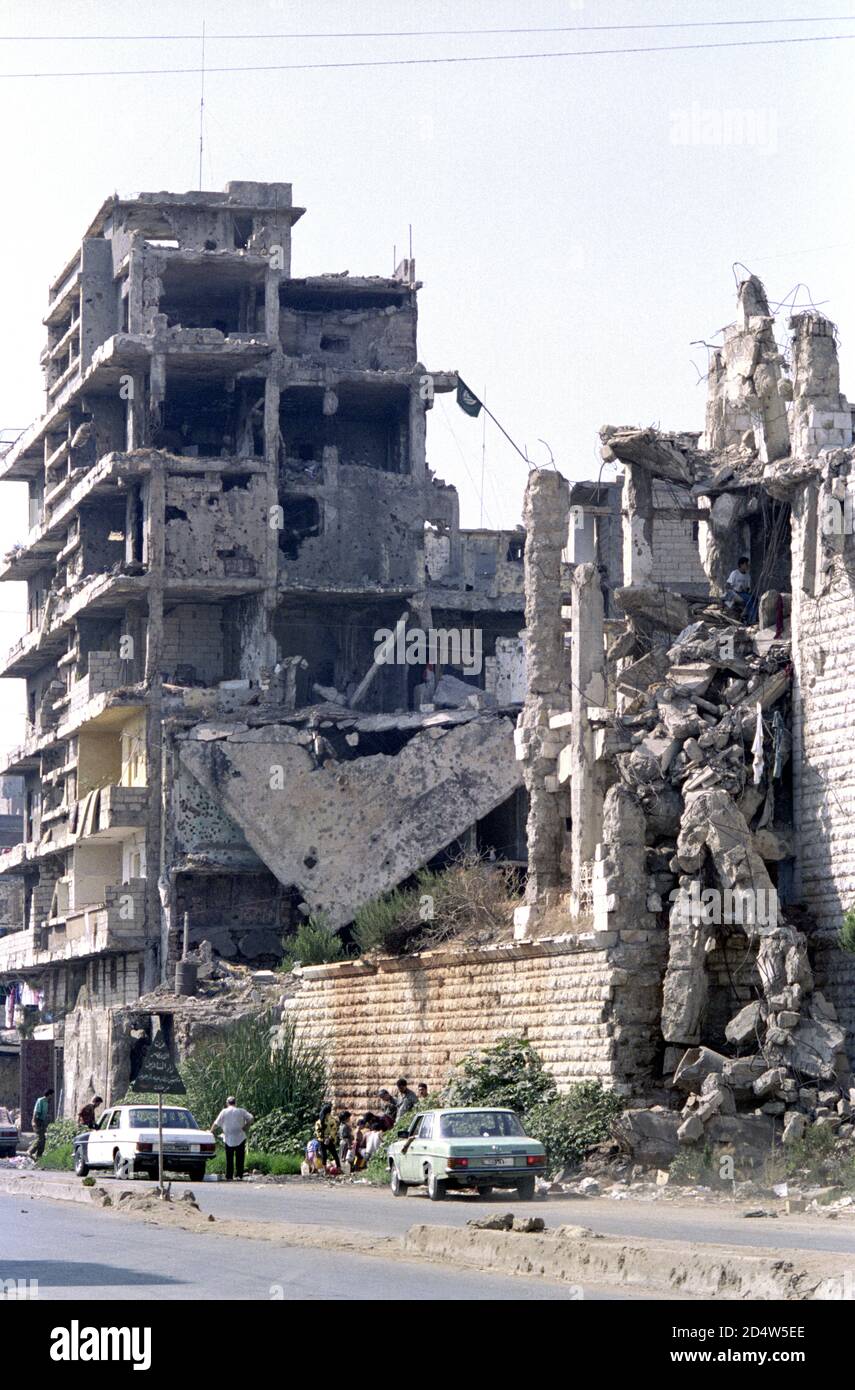 18th September 1993 After 15 years of civil war, life goes on in battle-scarred buildings on Michel Zakhour street, Beirut. Stock Photo