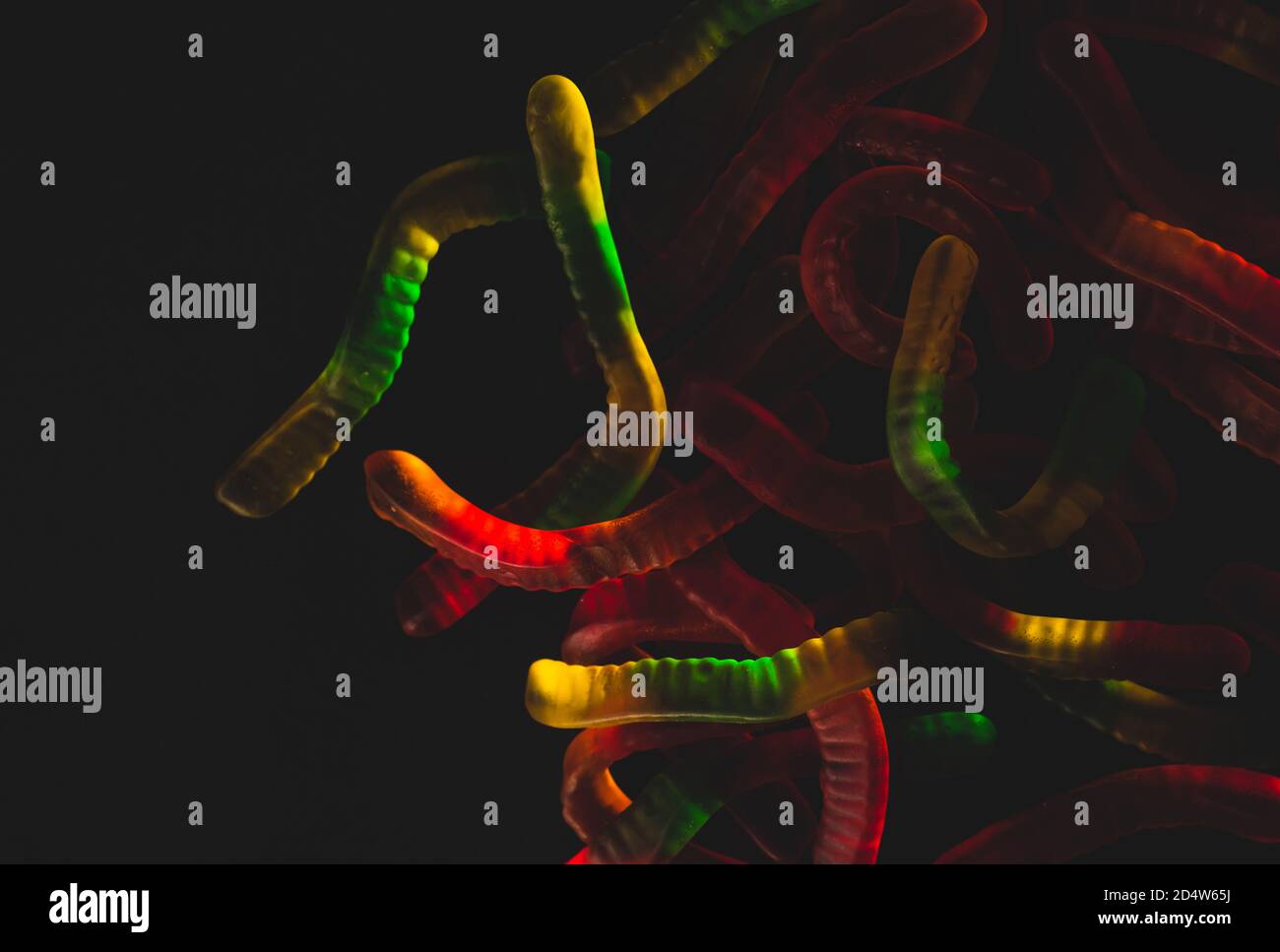 Jelly gummy worm sweet candy, Macro close up, selective focus Stock Photo