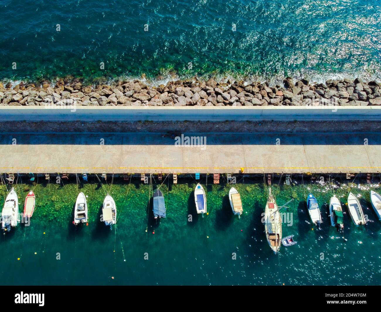 Aerial view of Kalamata marina with fishing boats in line Stock Photo