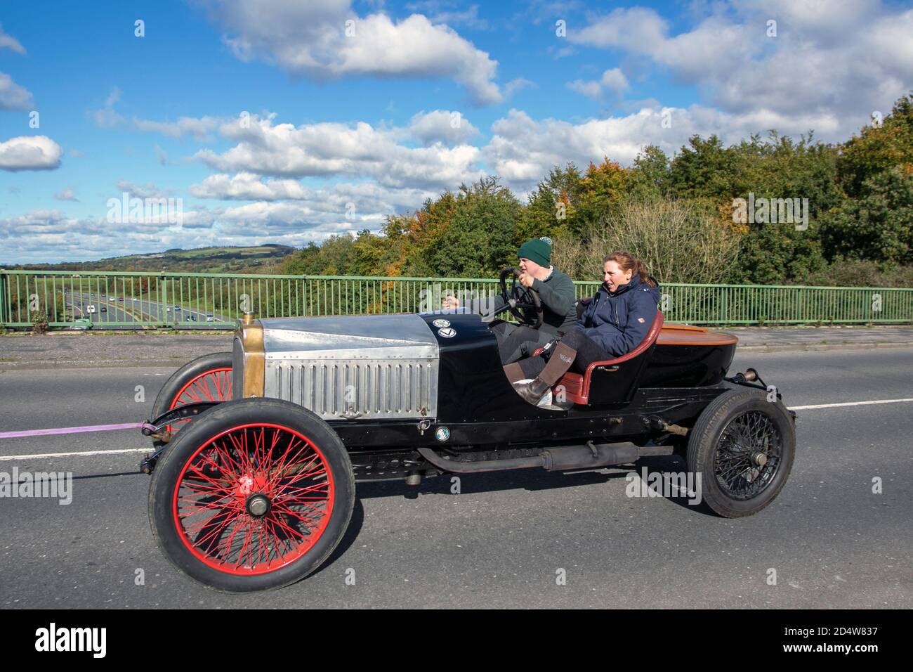 Vauxhall's D Type motor car Rare Vintage pre-war 1914 1900s black 3996 cc gets an outing on a sunny day in Chorley. The Vauxhall D-Type, or '25hp,' which first rolled off the production line in 1915, crossed battlefields on the Western Front (modern Germany, Luxembourg, and Belgium), Egypt, and Russian Empire. It had a 4-cylinder 3,969cc engine could take five passengers to just over 60 mph. Reserved for use by military higher-ups, the D-Type offered an  alternative to traveling through conflict zones by horse. One of only two D-types that survive. Stock Photo