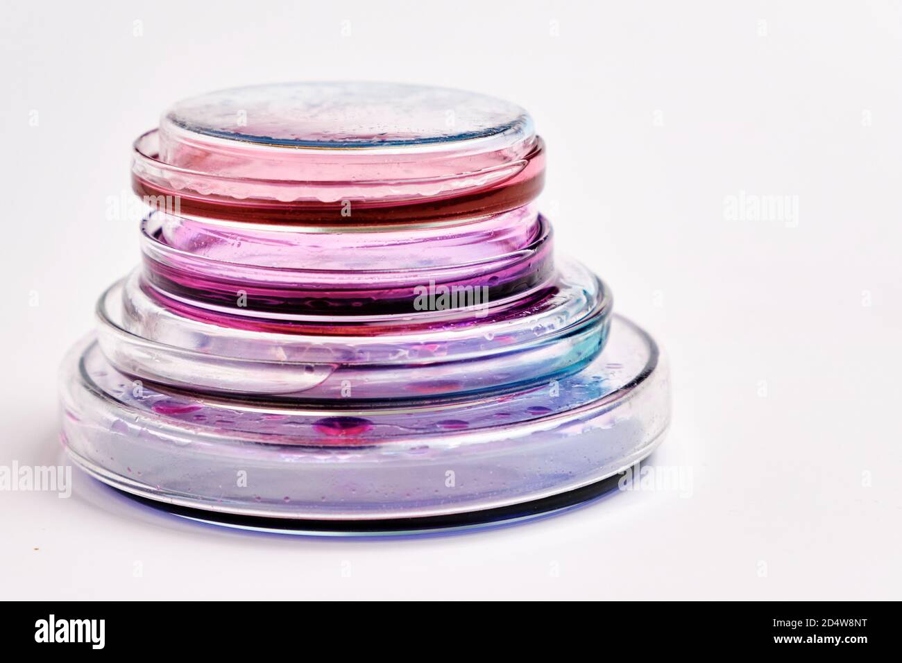 Pyramids from Petri dishes with colorful agar media with bacterial