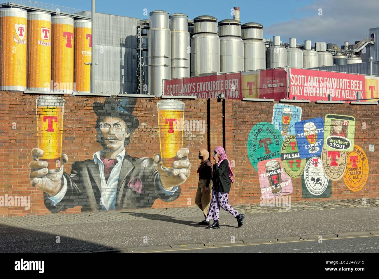 Glasgow, Scotland, UK, 11th October, 2020:Dennistoun voted eighth best place in the world to live by time out or eight h coolest place to live in the world. The gentrification of the east end working class area is reflected in the sites and people, The tennents brewery in drygate on duke street dominates the area with its art works. Credit: Gerard Ferry/Alamy Live News Stock Photo