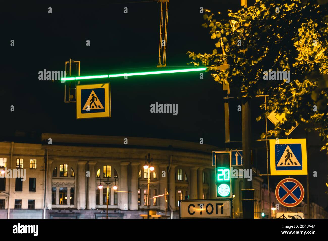 green traffic light neon lane repeater, night shot transport modern
