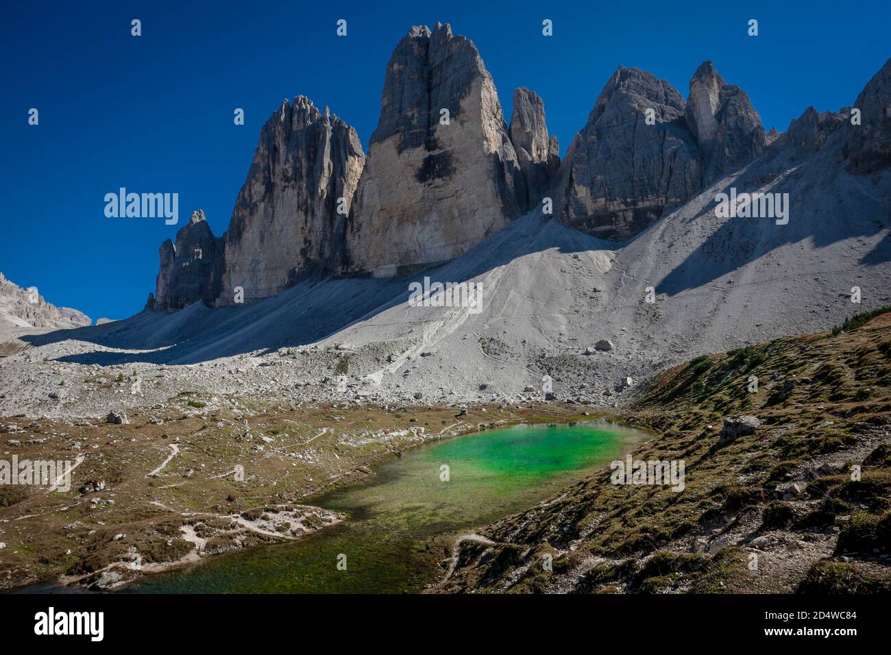Tre Cime de Lavaredo ('three peaks of Lavaredo') mountains with the Laghi dei Piani lakes in the Sexten Dolomites, european Alps, in northern Italy. Stock Photo