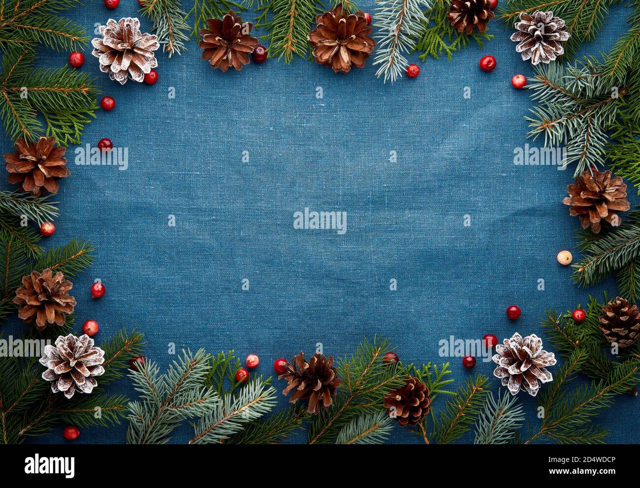 Christmas and Happy New Year dark blue background. Frame with fir ...