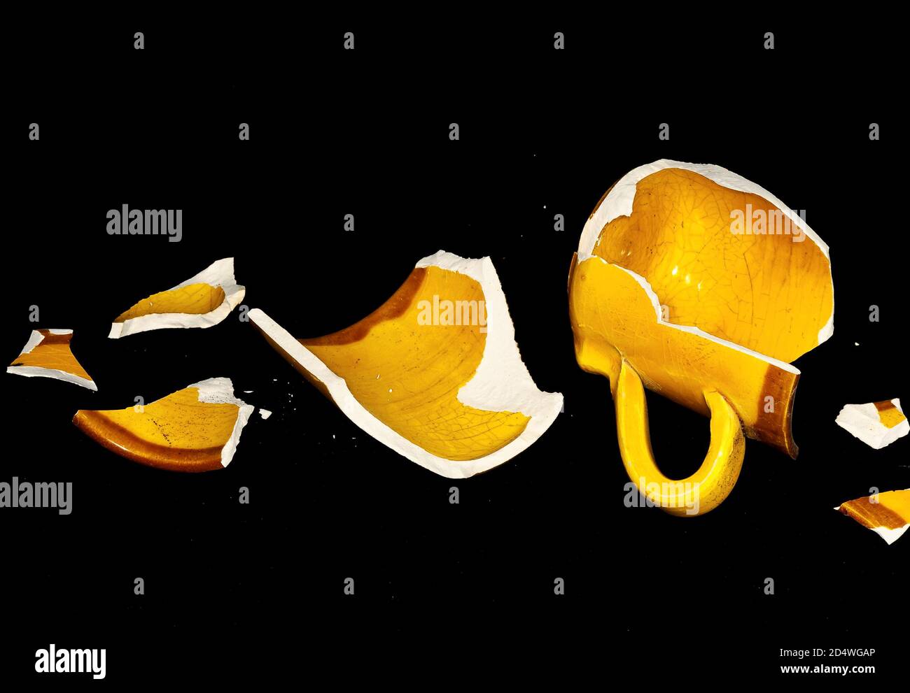 Broken Orange Coffe Cup Stock Photo