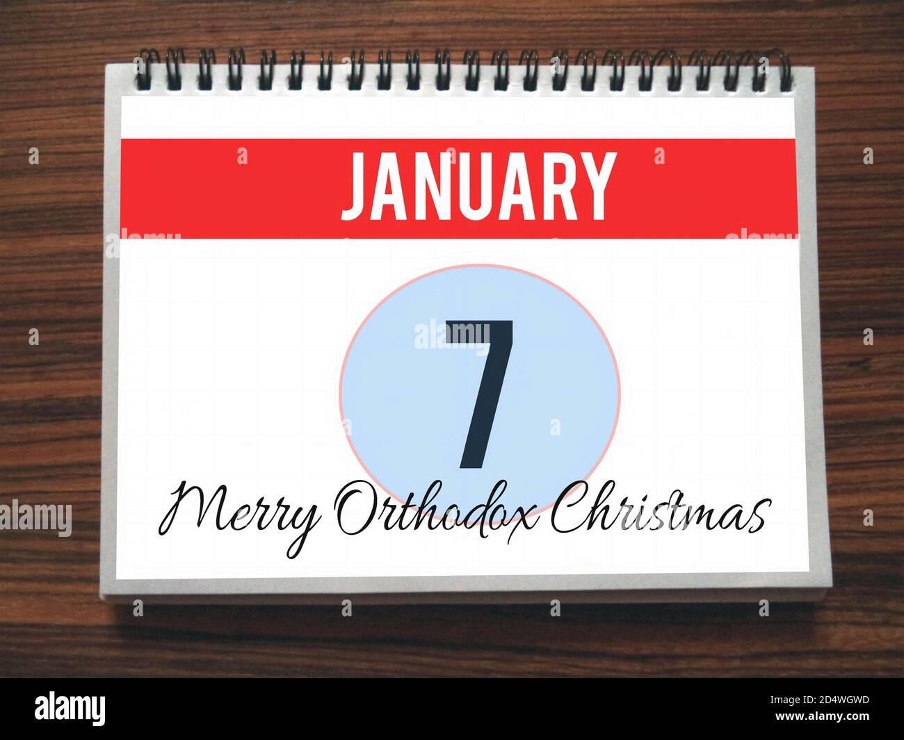 Calendar, January 7th, Merry Orthodox Christmas, on wooden background, illustration Stock Photo