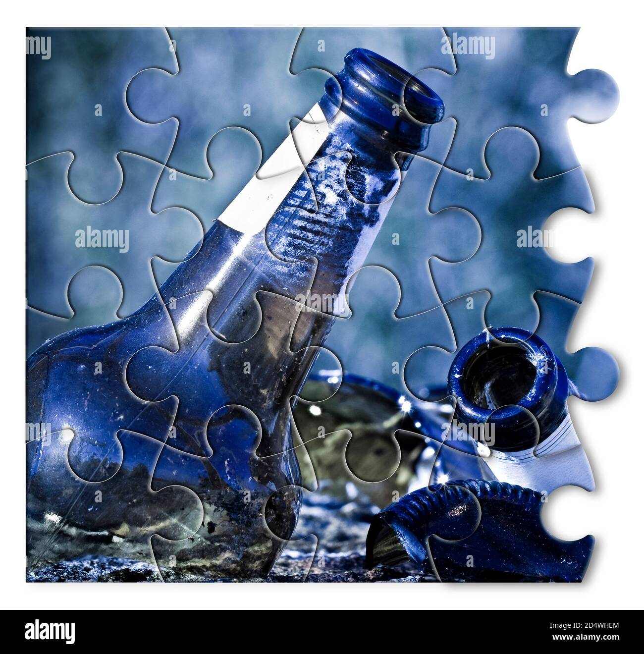 Smashed bottle of beer resting on the ground - Address the alcoholism issue  - Concept image in jigsaw puzzle shape Stock Photo