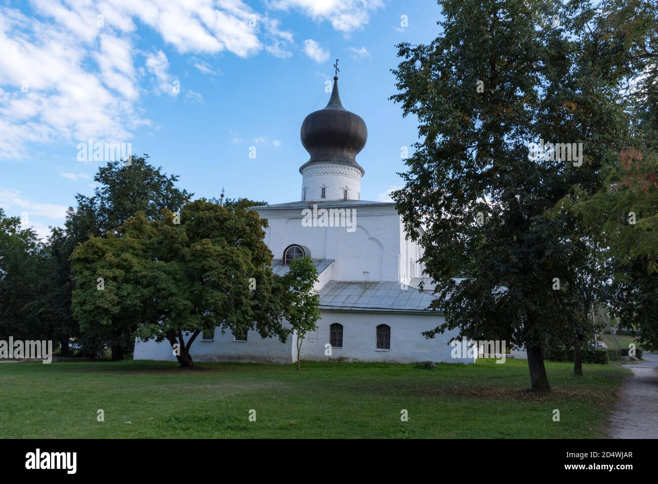 Assumption church from Paromenya (Uspenskaya church, XVI century) and its bell tower. Pskov city, Pskov Region (Pskovskaya oblast), Russia. Stock Photo