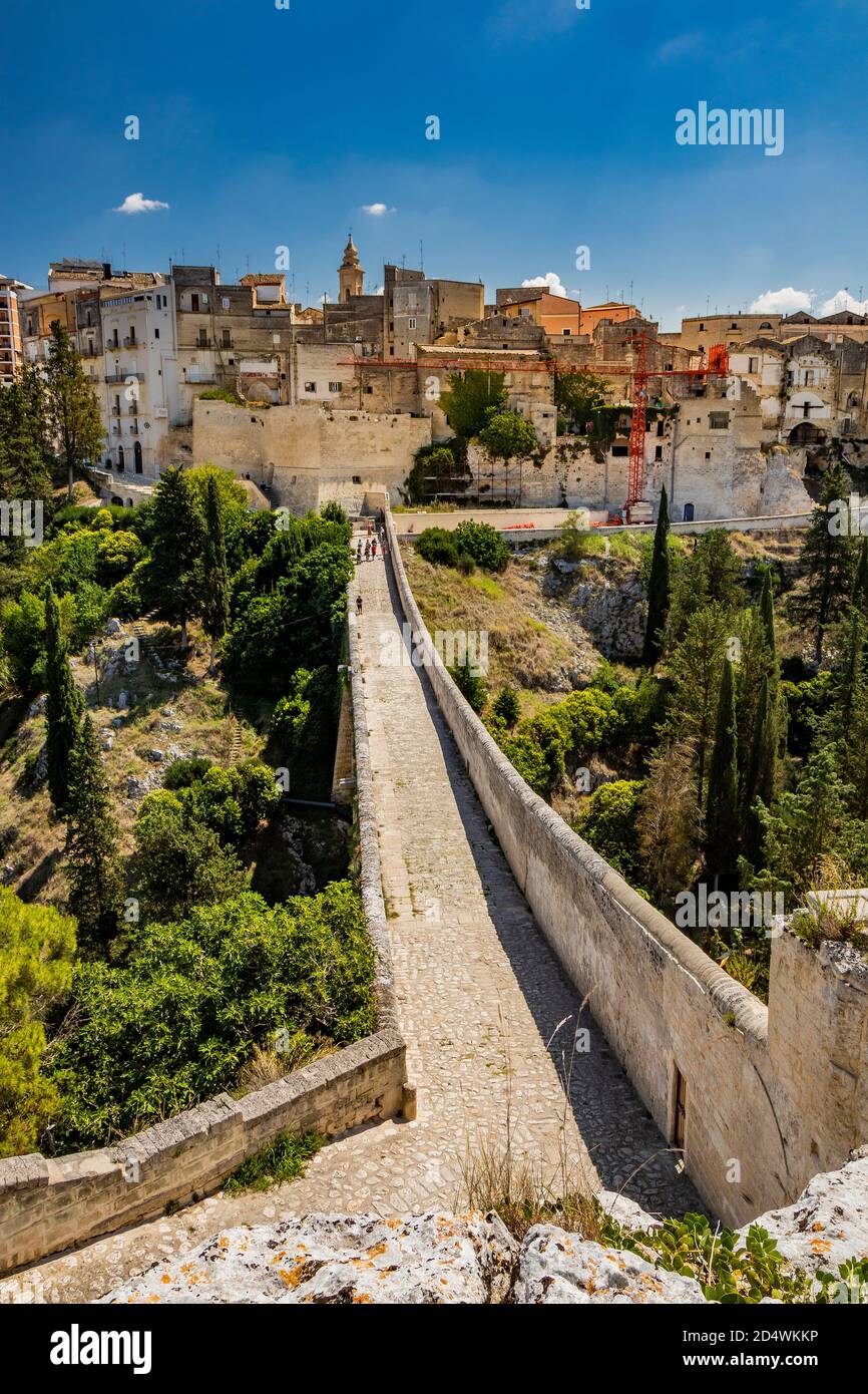 Gravina in Puglia, Italy. The stone bridge, ancient aqueduct and viaduct. On the other side of the valley where the Gravina stream flows, the skyline Stock Photo