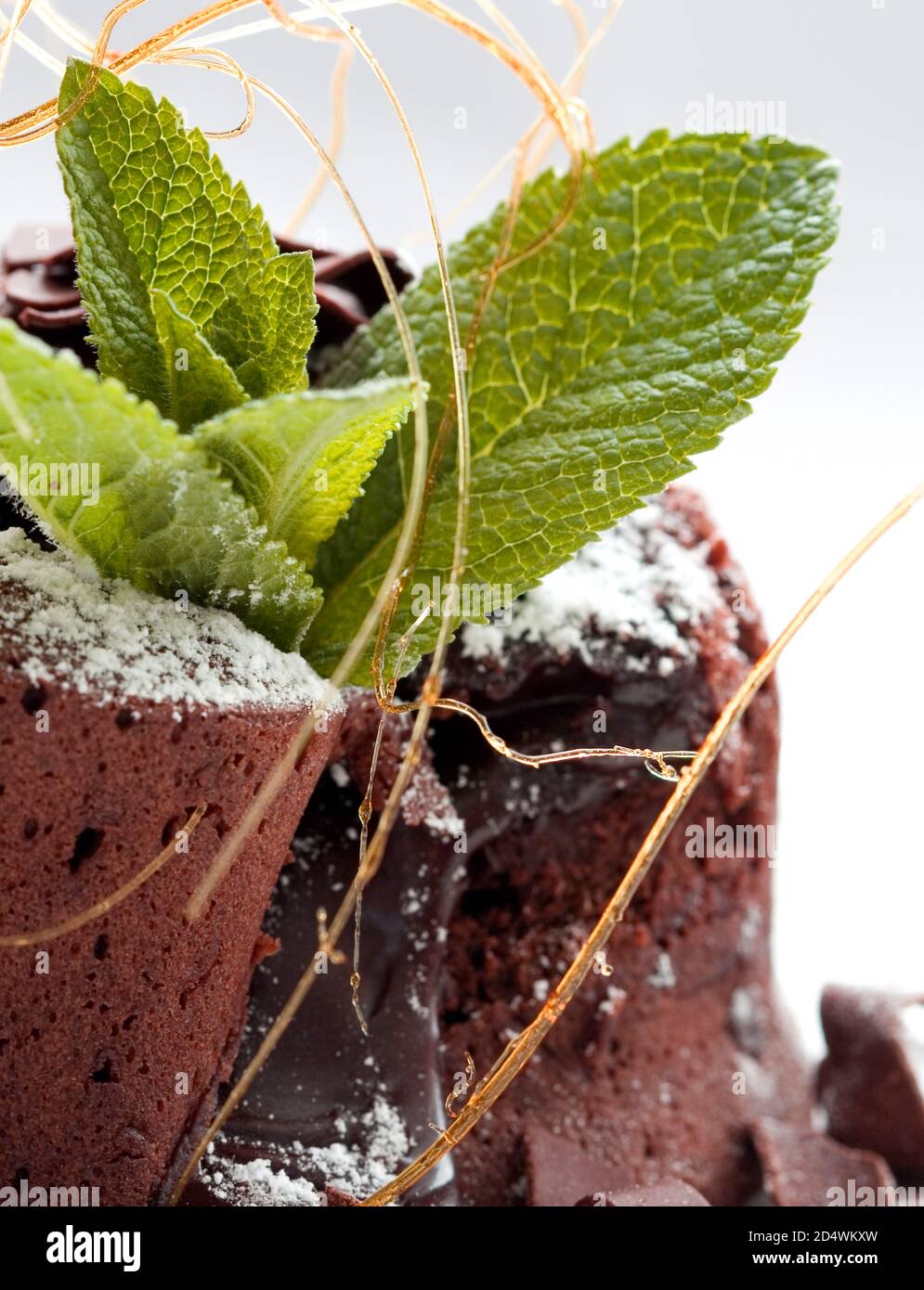 Mint leaf garnish topped cake Stock Photo Alamy