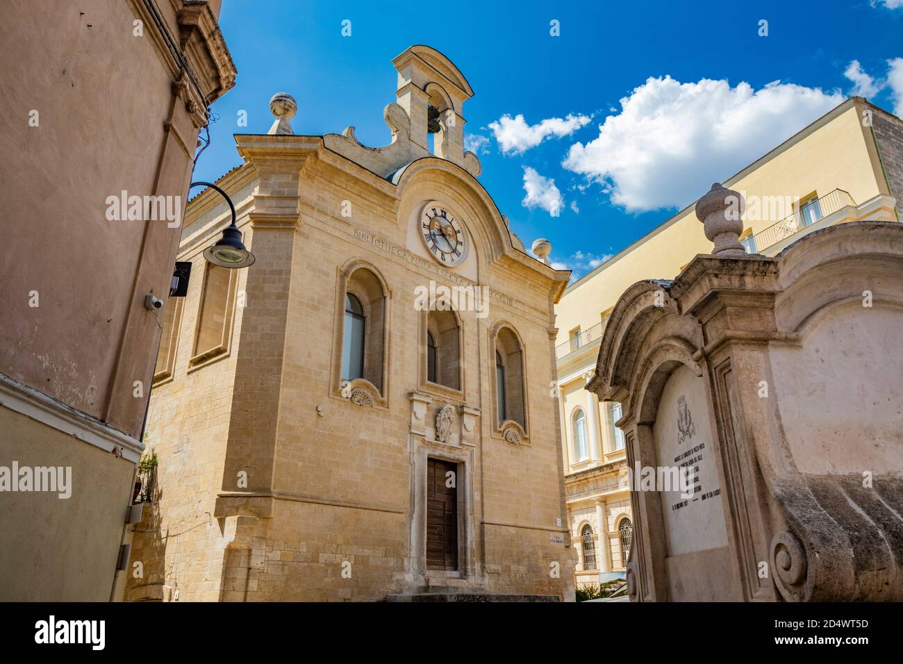Gravina in Puglia, Italy. A glimpse of the main square of the ancient city, overlooked by the library. The large fountain in the center. Stock Photo