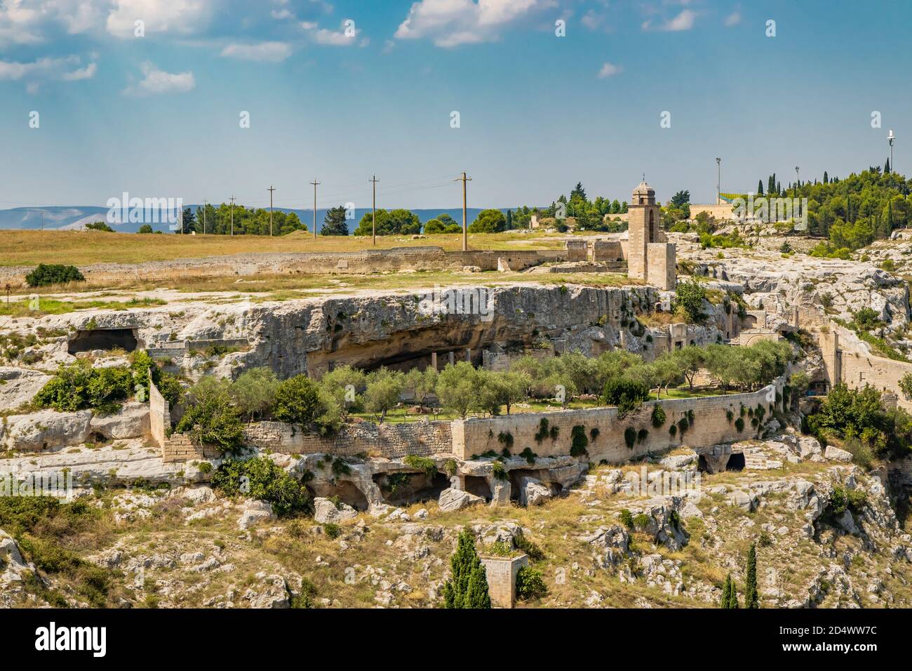 Gravina in Puglia, Italy. The Sanctuary Madonna della Stella, with its bell tower and the ancient cave church carved into the rock. Stock Photo