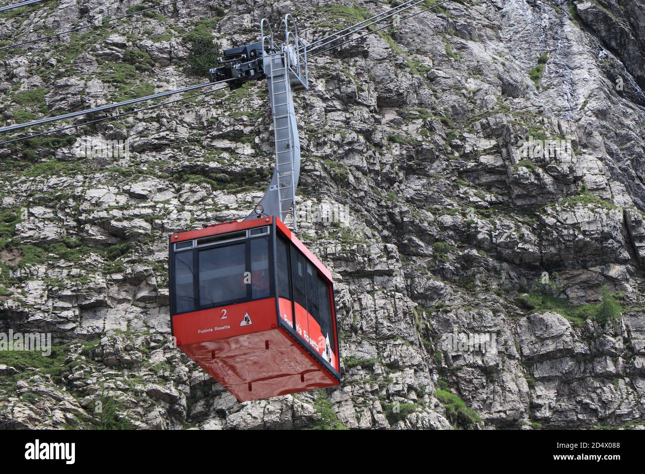 A cable car coming down the mountain. High quality photo of a funicular railway Stock Photo