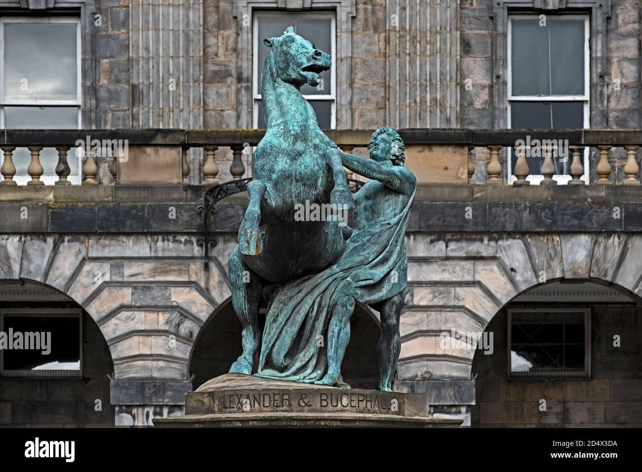 The bronze statue of Alexander the Great and his horse Bucephalus in the courtyard of Edinburgh City Chambers in Edinburgh's Old Town. Stock Photo