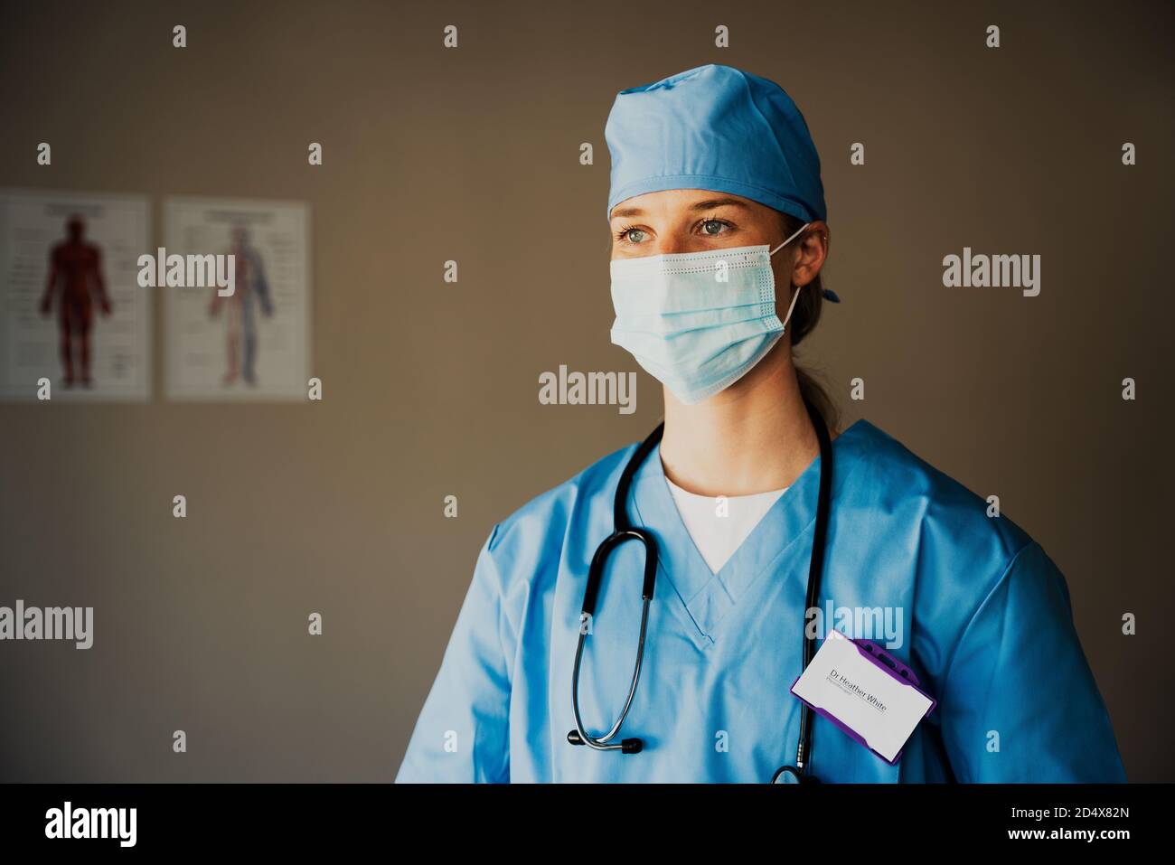 Portrait young nurse in scrubs hi-res stock photography and images - Alamy