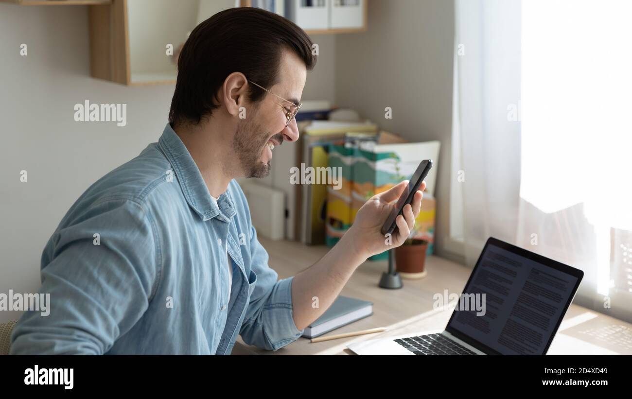 Reading Om Computer Excited young adult businessman reading hi-res stock photography and ...