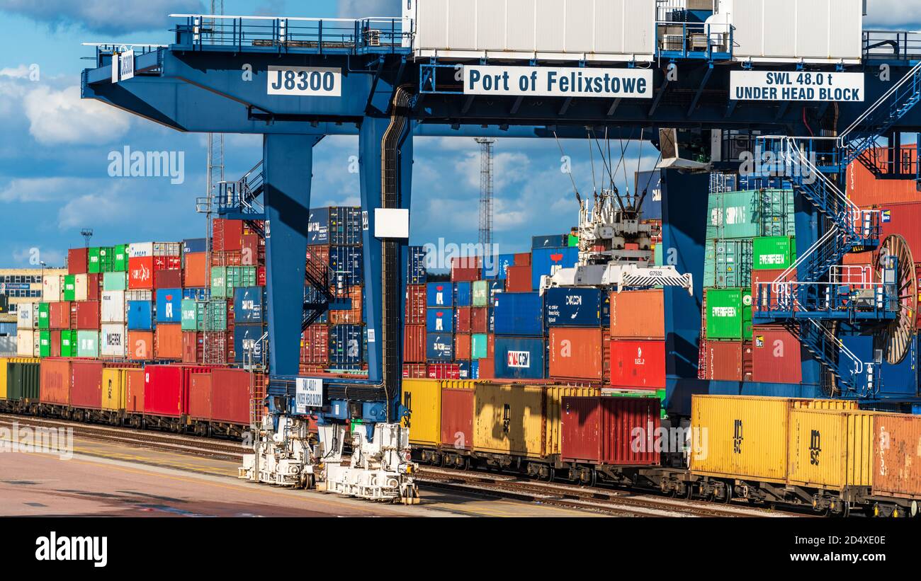 Felixstowe Port Rail Freight UK - Intermodal Containers being loaded onto freight trains in Felixstowe Port. Global Supply Chains. Stock Photo