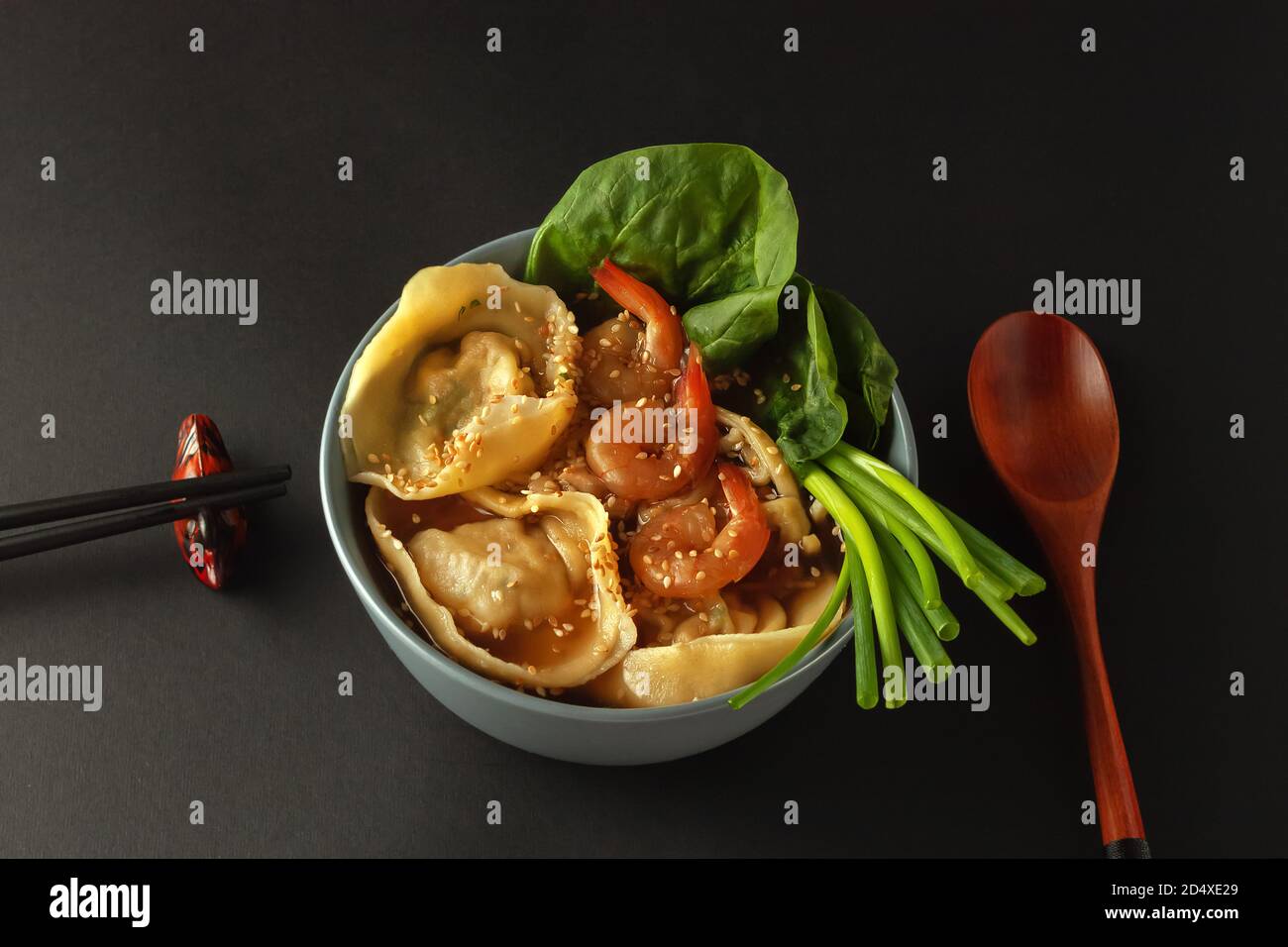 Shrimp noodle soup with wontons and spinach Stock Photo Alamy