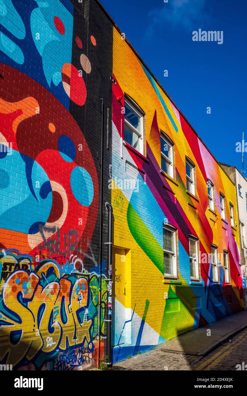 Eyecatching Graffitti adorns buildings in London's fashionable Shoreditch district. Street Art Shoreditch London. Stock Photo