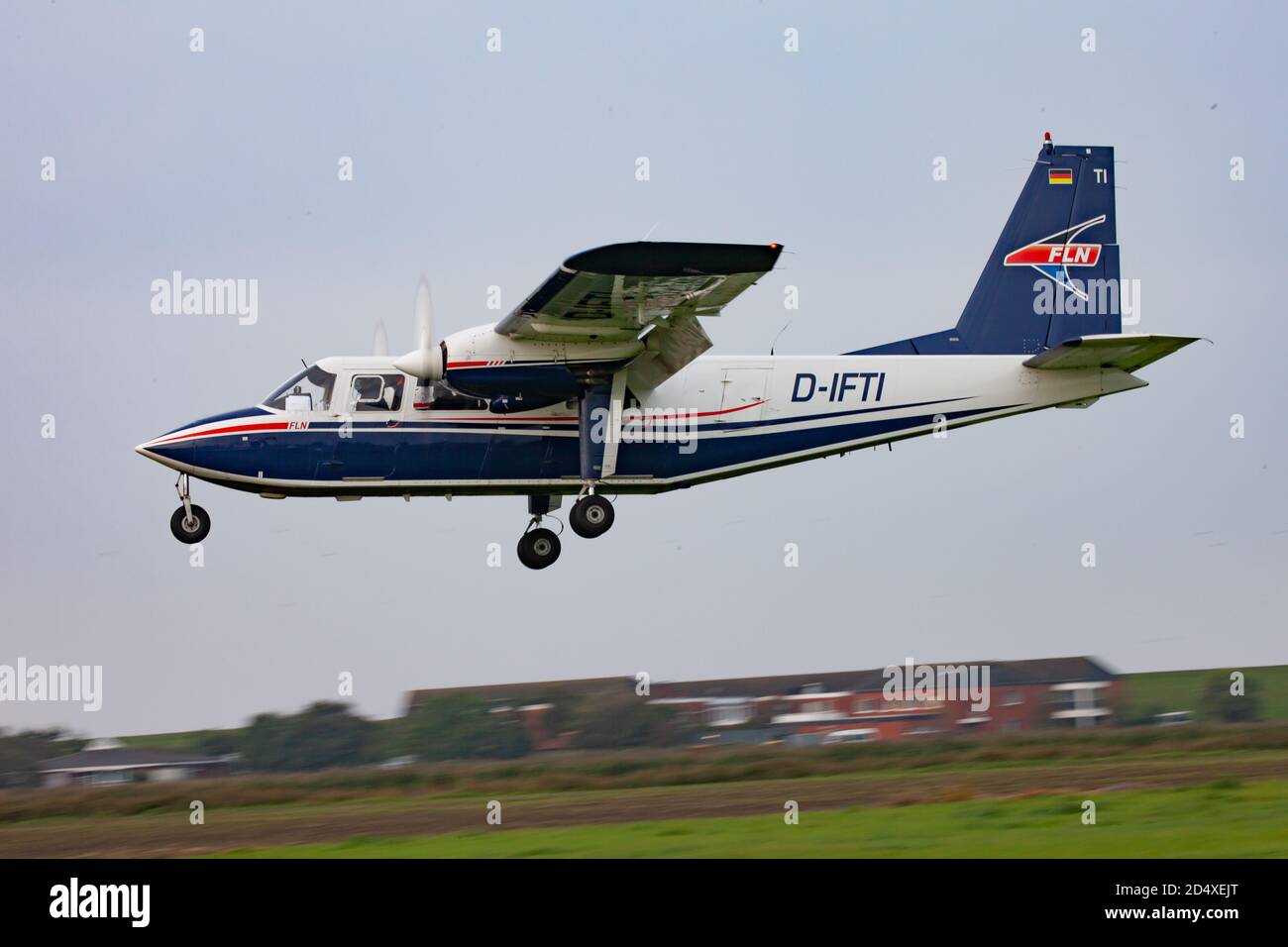 Twin engined aircraft coming in to land from the Frisian Islands. East Frisia, Lower Saxony. Germany. Stock Photo