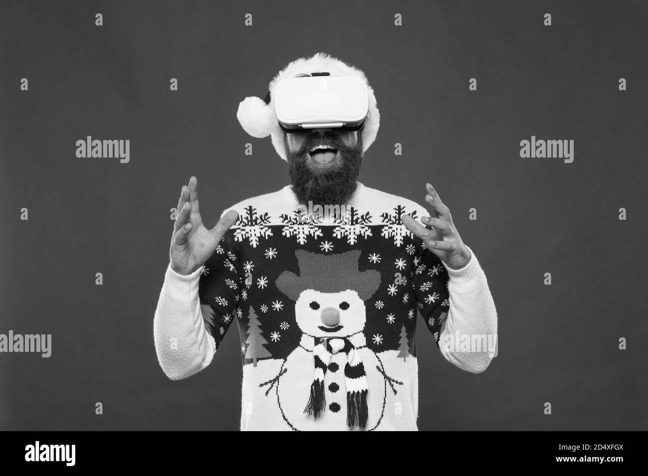 Virtual life. Man celebrate christmas virtual reality device. Gadgets review. Techno blogger. Bearded hipster play game vr. Merry christmas. Virtual achievement. Future year. Technologies development. Stock Photo