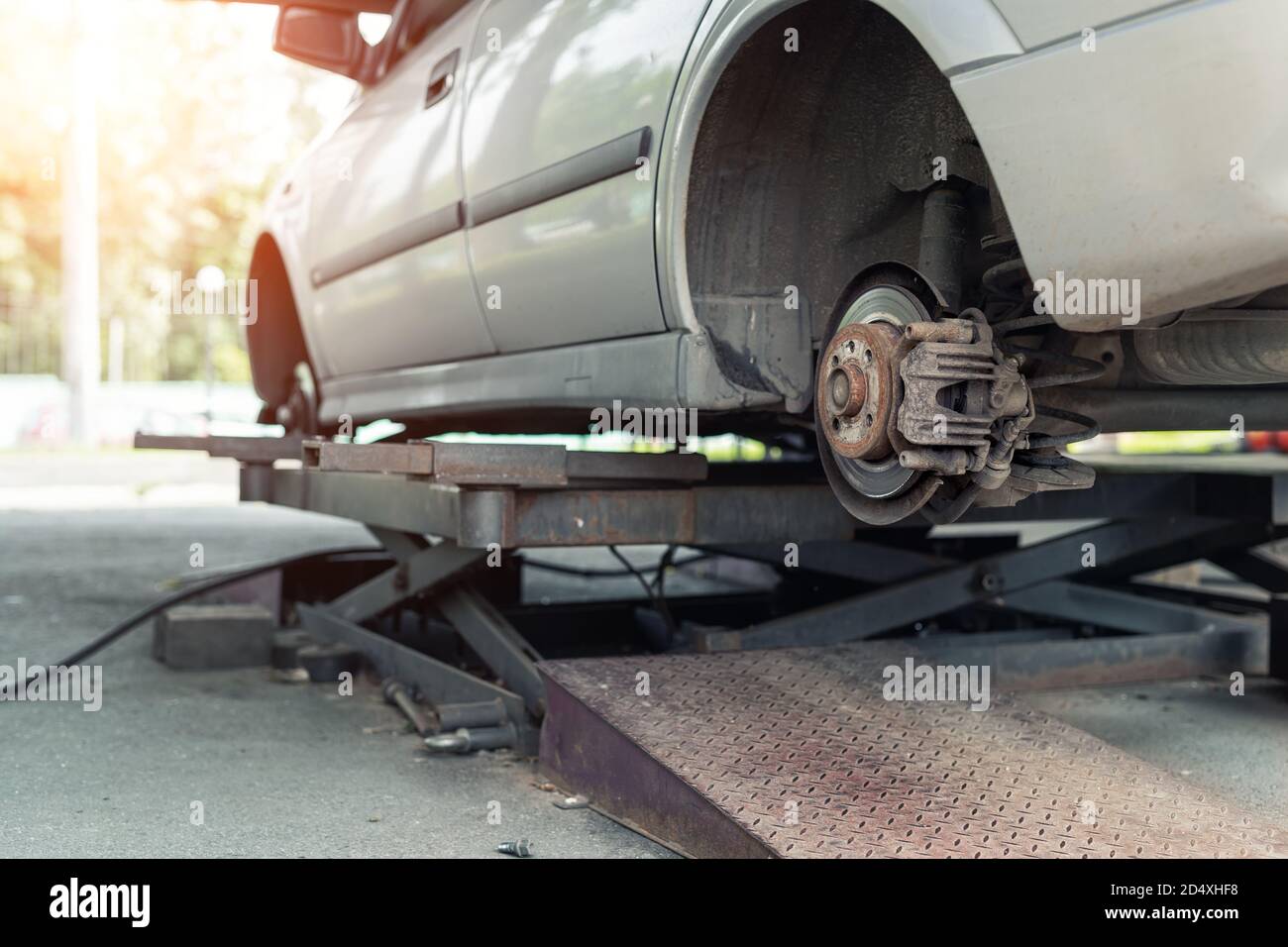 Car wheel repair shop outdoor ground . Seasonal winter tyre change at