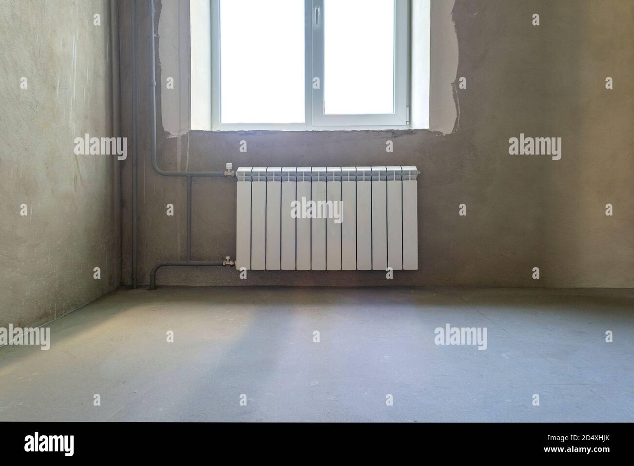 Room interior with radiator and without decoration Stock Photo