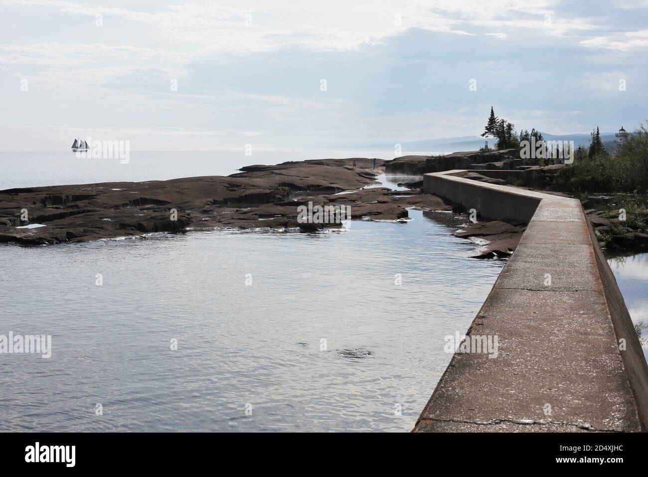 A traditional schooner, the Hjordis, in the distance on Lake Superior