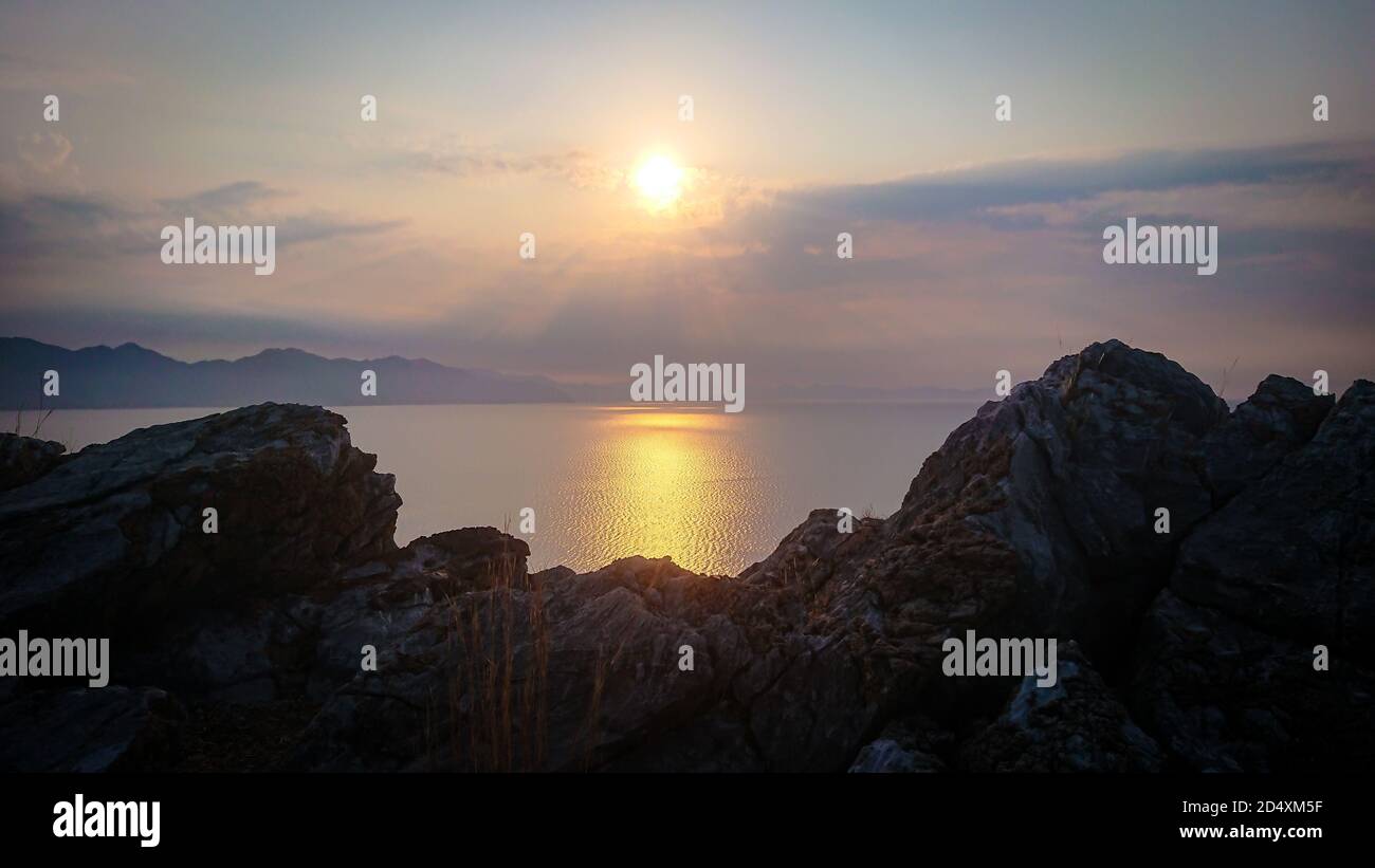 Sunrise over the Aegean Sea from the ancient city of Amos, near Marmaris in Turkey Stock Photo