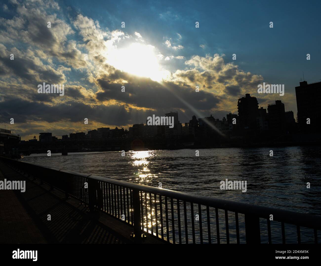 Tokyo, Japan 3/01/16 Beautiful sun setting within the clouds
