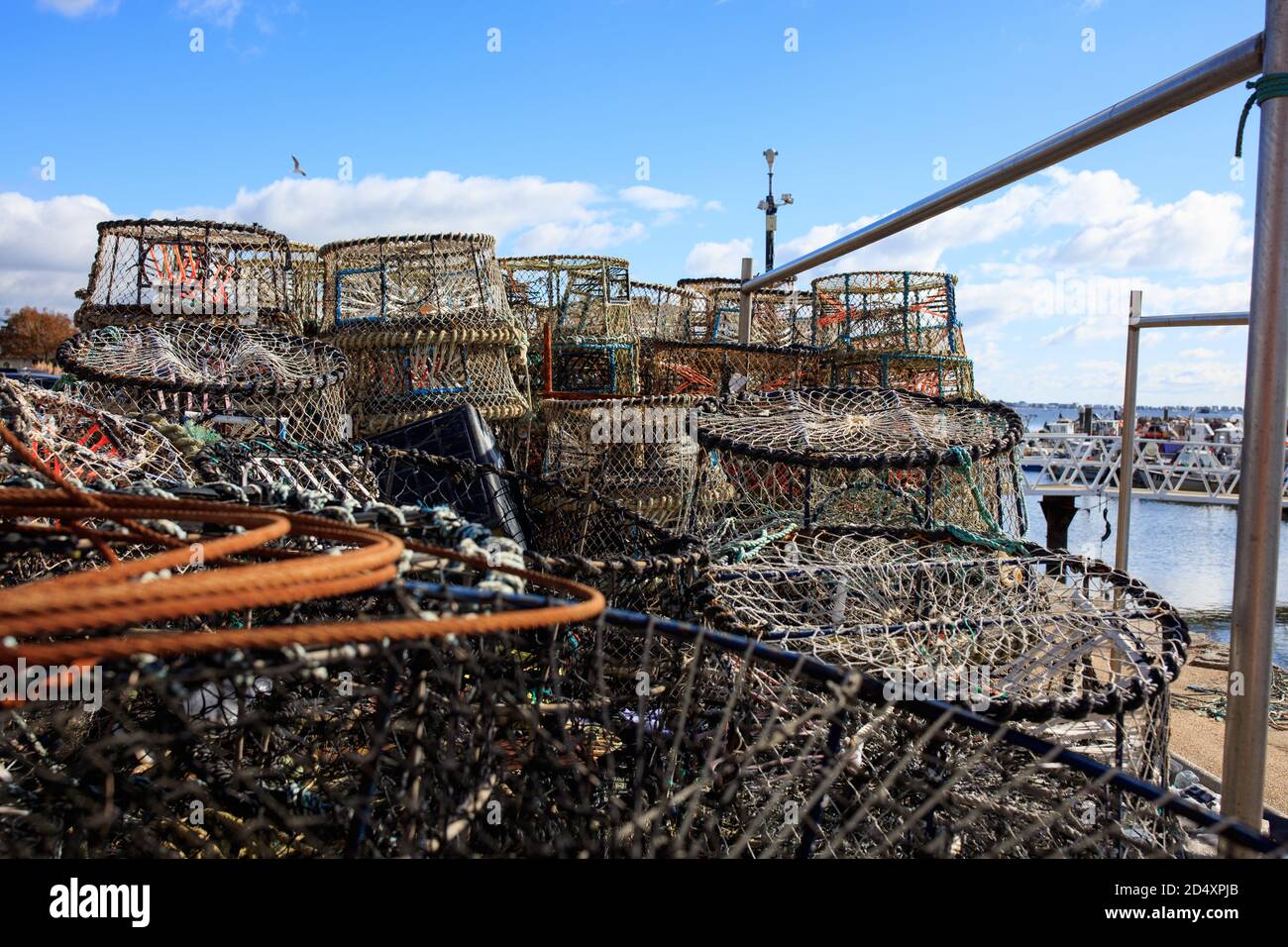 Crab pots stacked on the harbour at Poole Quay, Dorset Stock Photo Alamy