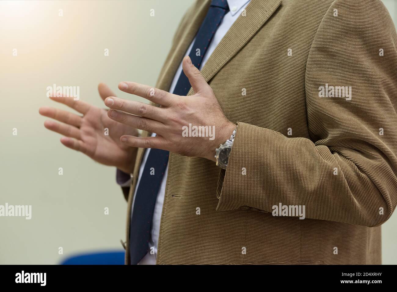 Selective focus on  teacher  while teaching and explaining lessons to students in classroom. Computer lab class, technology and aducation concept. Stock Photo