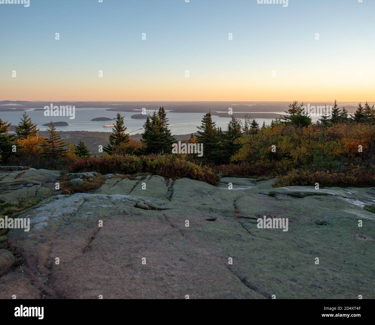 Cadillac Mountain in Acadia National Park Maine during Sunrise, with fall foliage. Stock Photo