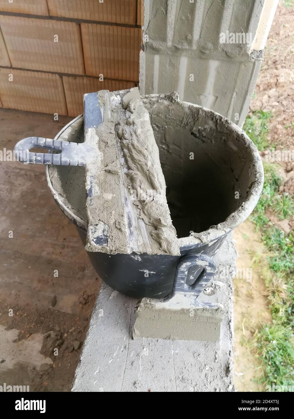 Taping knifes and cement bucket(construction work tools) for