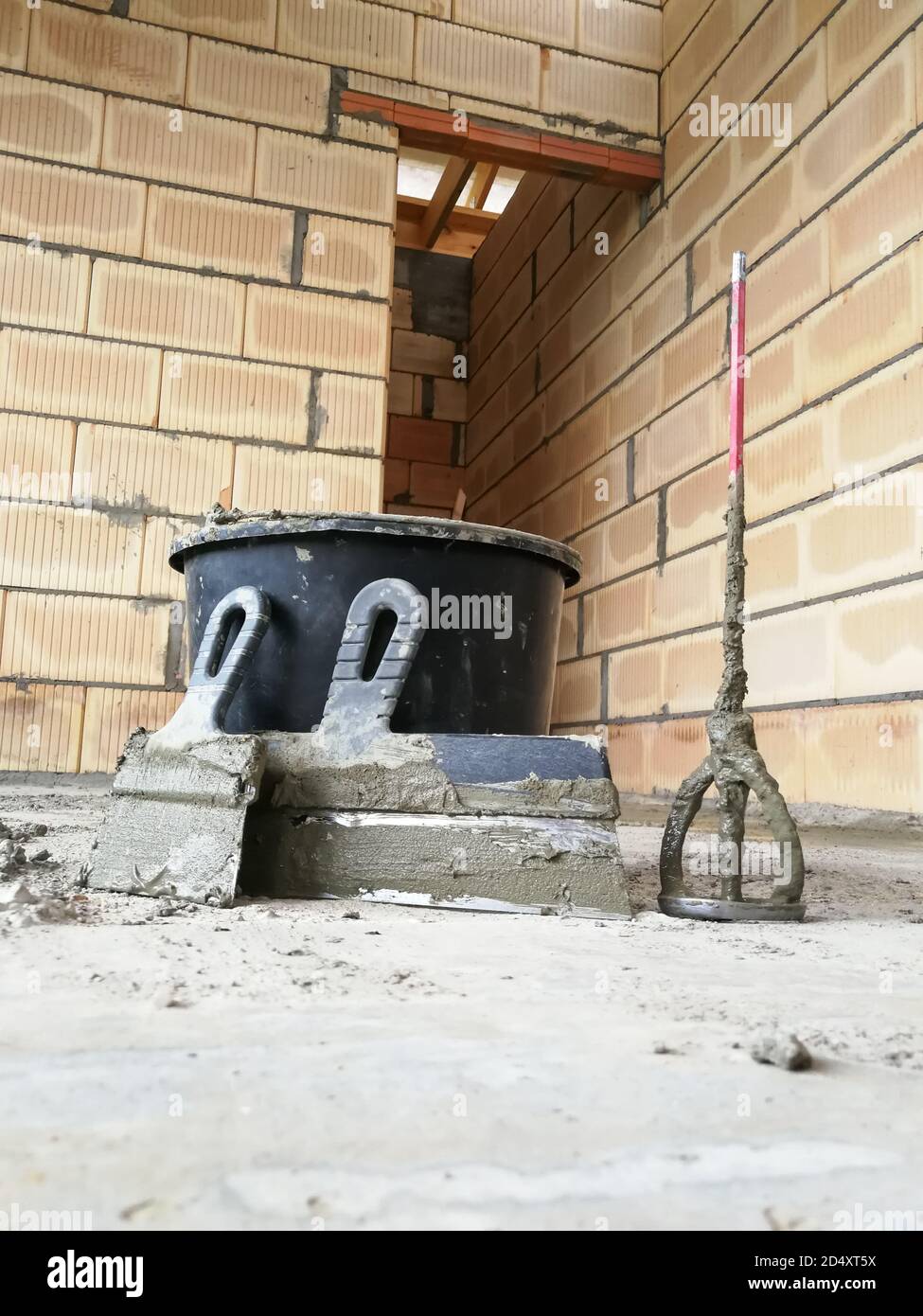 Taping knifes and cement bucket(construction work tools) for