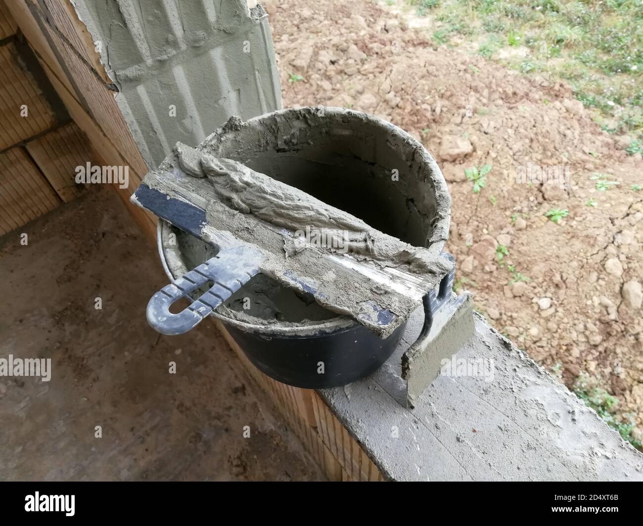 Taping knifes and cement bucket(construction work tools) for