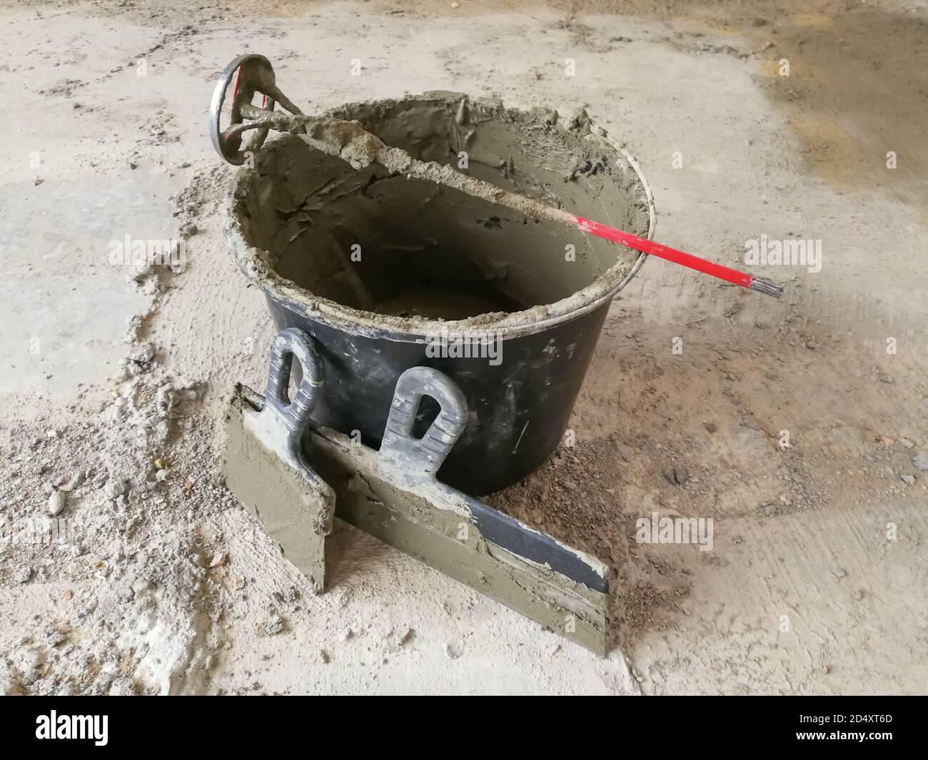 Taping knifes and cement bucket(construction work tools) for