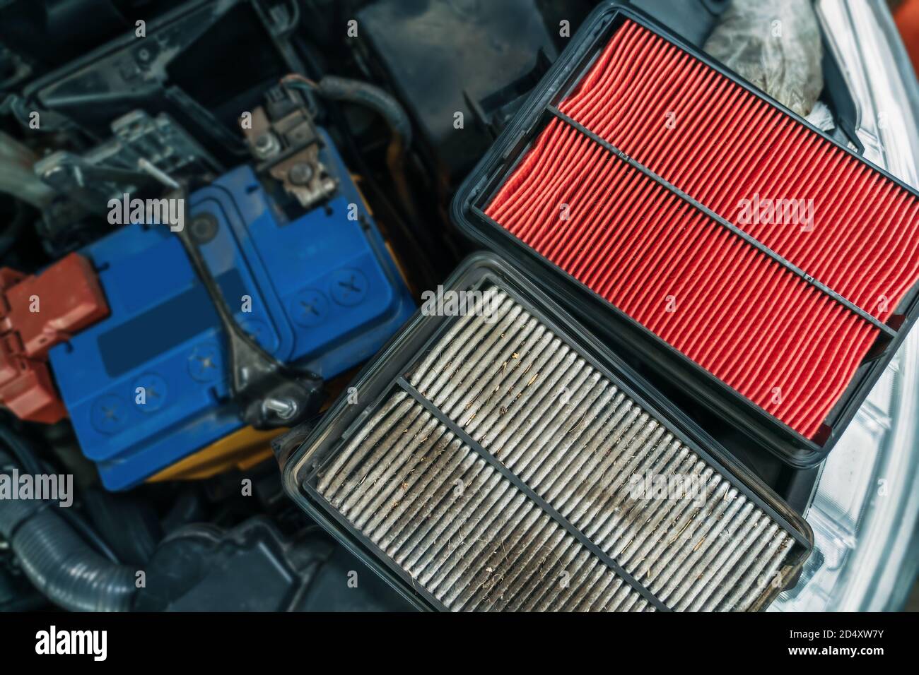 Used dirty Air Filter and New one, timely maintenance and service of your car. Stock Photo