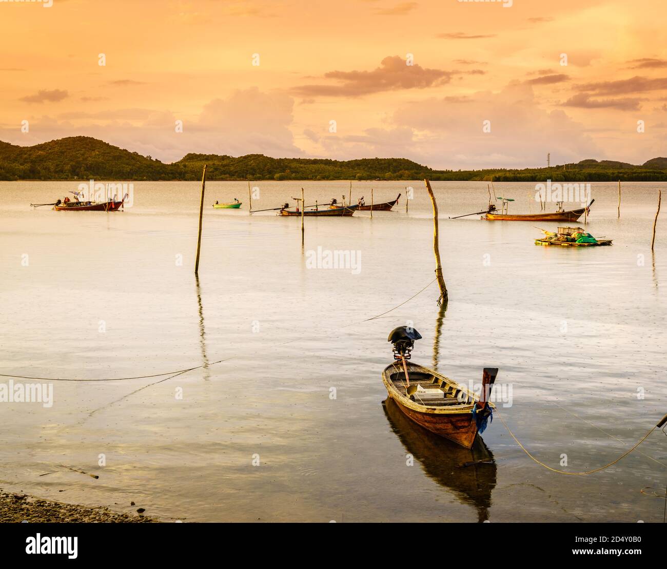 Thai long tail fishing boats at fishing village on Ko Yao Yai island in the Andaman Sea in Thailand Stock Photo