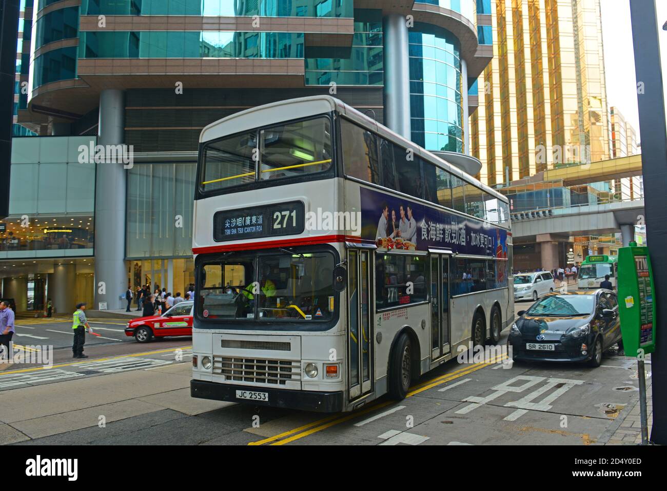 Double deck buses on Canton Road in Tsim Sha Tsui, Kowloon, Hong Kong, China. Stock Photo