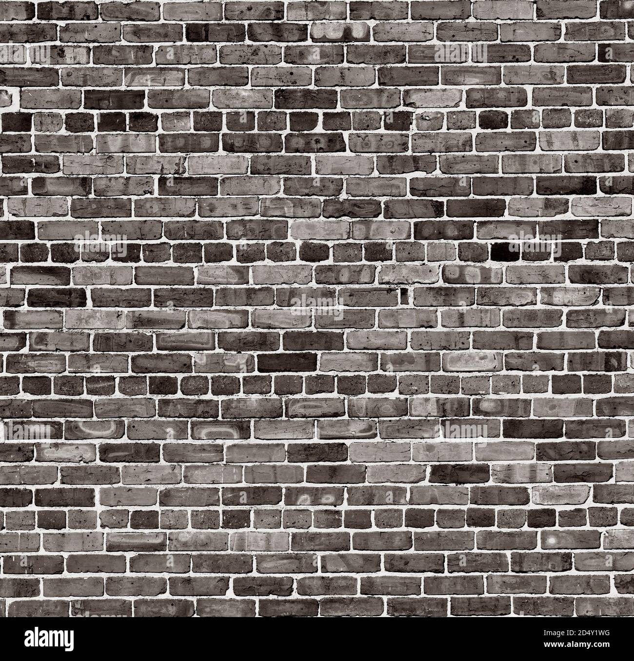 Dark black and white brick wall with rough masonry texture Stock Photo
