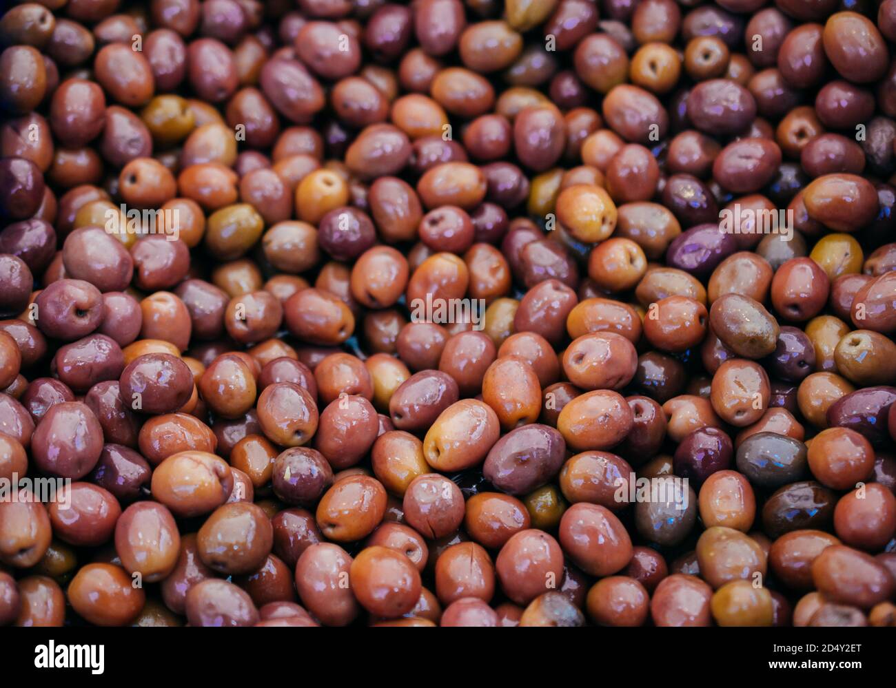 Green olives as health food preserved in olive oil Stock Photo Alamy