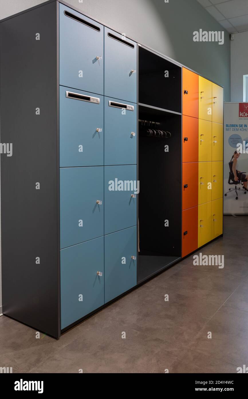 an office with colorful doors and an integrated wardrobe Stock Photo Alamy