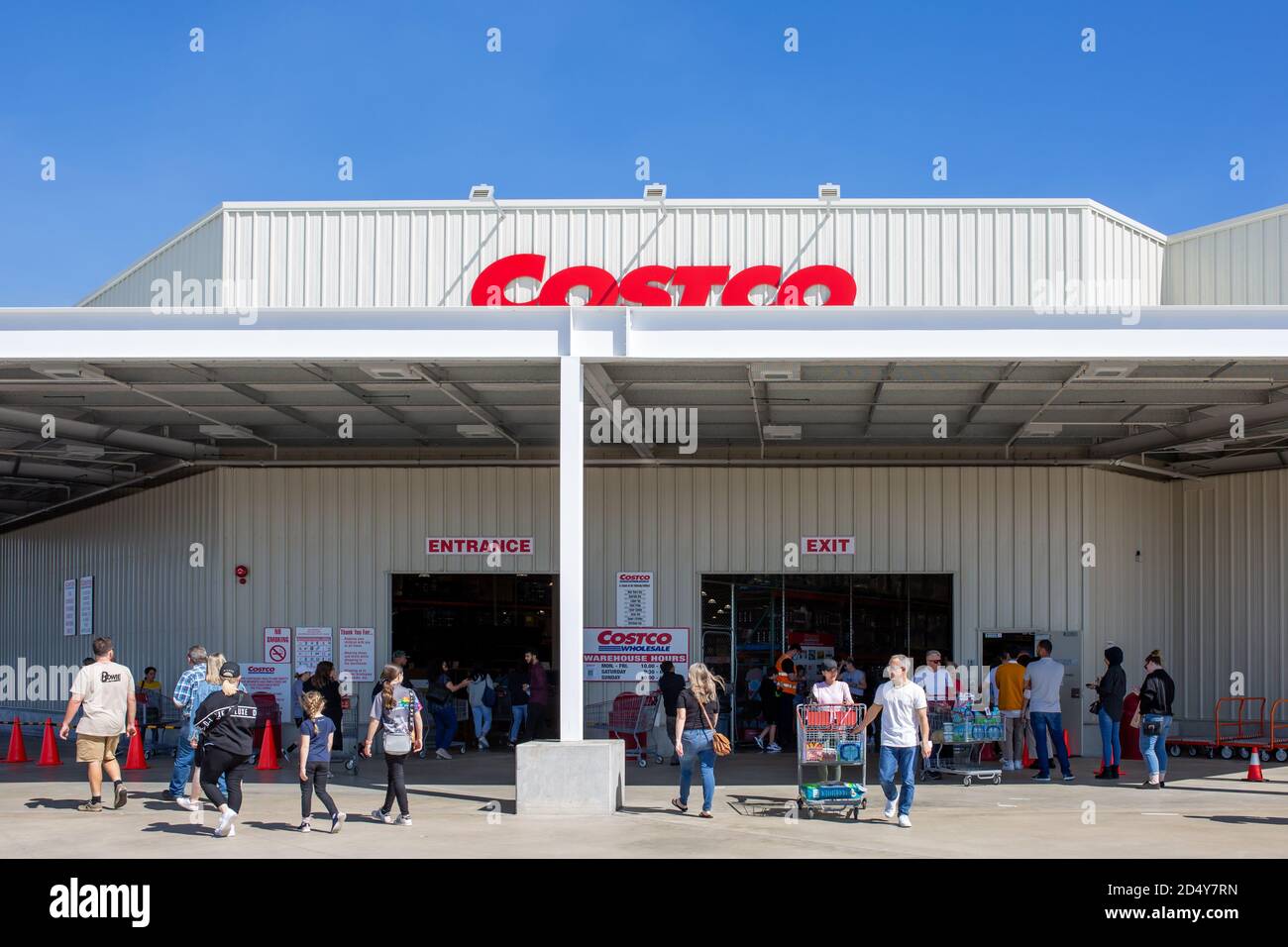 Perth, Australia - September 13th 2020: Entrance to Costco warehouse in Perth, with shoppers entering and exiting with trolleys Stock Photo